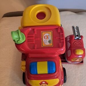Vibrant Red and Yellow Fire Engine Toy